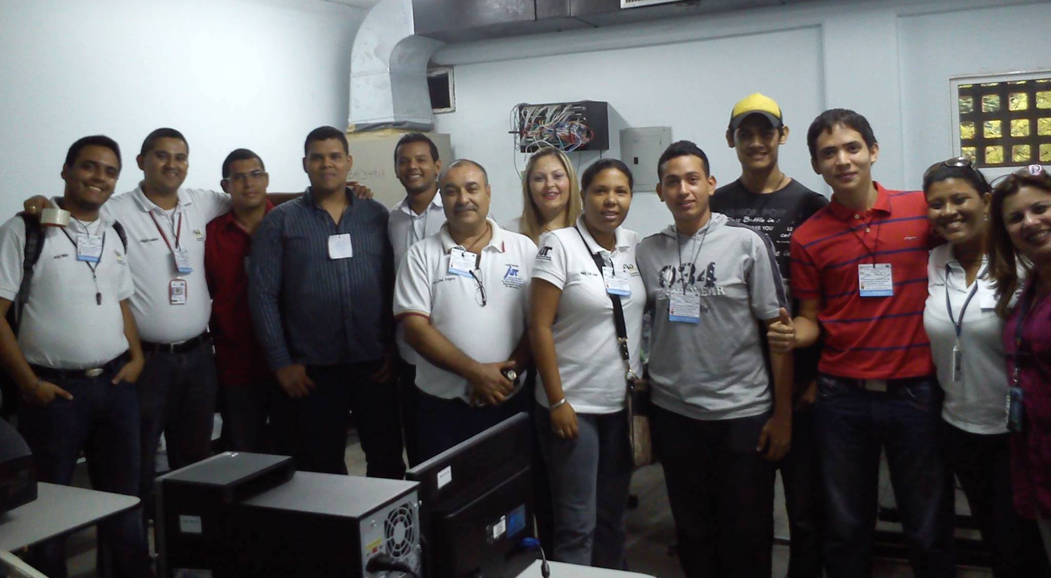 Juan Delgadillo, friends, and teachers after winning university informatics olympiads at Maracaibo University Institute of Technology